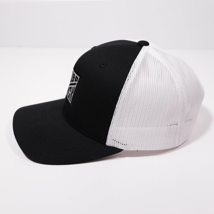 EMBLEM TRUCKER CAP DELUXE - BLACK & WHITE